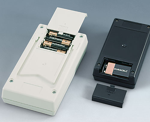 Cajas para aparatos de medición con compartimento para pilas